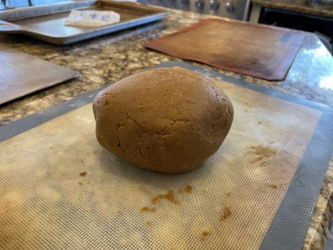 Ball of Gingerbread dough waiting to be rolled out.